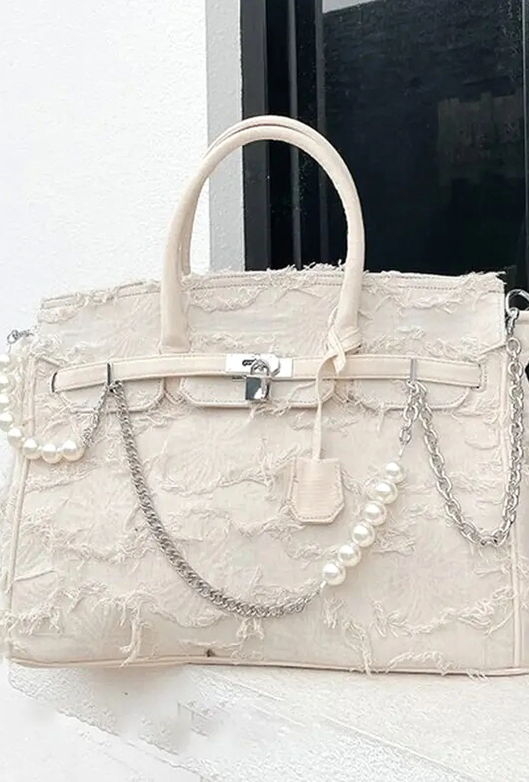 BRITTA - FRAY TEXTURED KELLY BAG